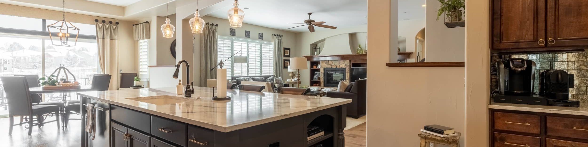 Technician repairing modern stainless steel kitchen appliances